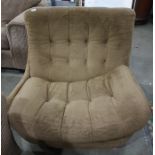 Mid twentieth century Englander designer swivel chair, upholstered in brown with buttonback