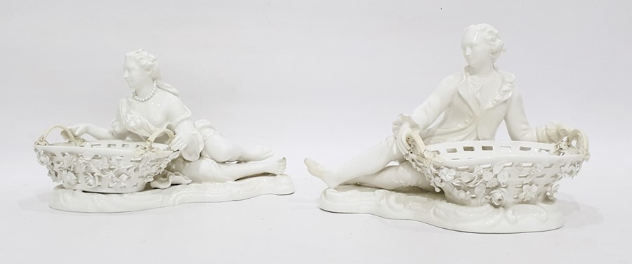 Pair Dresden porcelain sweetmeat holders, in the form of reclining lady and gentleman in 18th