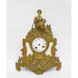 French ormolu mantel clock topped with female figure and harvest decoration, including plough and