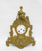 French ormolu mantel clock topped with female figure and harvest decoration, including plough and