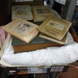 Quantity of table linen, etc and a quantity of books to include Beatrix Potter titles, R K