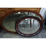 Bevel edged oval mirror with carved wooden frame and another (2)