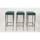 Five bar stools on brushed steel bases with green vinyl seats (5)