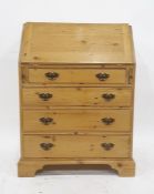 Pine bureau of four long graduated drawers, to bracket feet, 73.5cm x 101cm