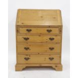 Pine bureau of four long graduated drawers, to bracket feet, 73.5cm x 101cm