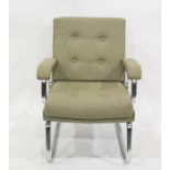 Low office type chair in sage green buttonback upholstery and on chrome-style supports
