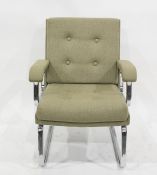 Low office type chair in sage green buttonback upholstery and on chrome-style supports