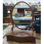 19th century figured mahogany oval frame swing toilet mirror on serpentine-fronted box base with