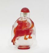 Chinese scent bottle, the clear body decorated with amber winged horse