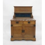 Early 20th century Arts & Crafts-style washstand, the oak back with blue tiles, marble topped
