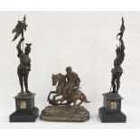 Pair of spelter figures bearing flags, raised on black slate bases and further spelter figure of man