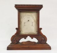 W Moody Bell of Cheltenham mantel barometer with silvered arched dial and housed in a mahogany