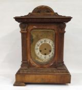 Walnut-cased mantel clock with fluted pilasters, egg and dart moulding, Arabic numerals to the