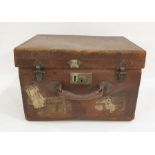 Brown leather hat box emblazoned initials to the lid, various old labels to the body
