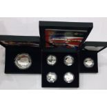 Collection of 50th anniversary Mini car, to include 1 x £5 solid silver coin, 4 x solid silver £5