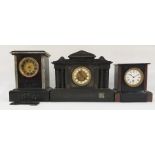 Three black slate assorted mantel clocks, each with Roman numerals, one in the Greco-Roman