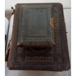 Three various photograph albums, one with floral decorated pages containing Victorian, sepia and
