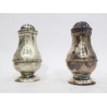 Two Georgian silver muffineers of baluster form (Makers Marks indistinct, London)