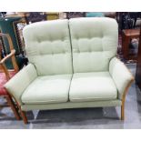 S Rouse & Co two-seater sofa in green upholstery
