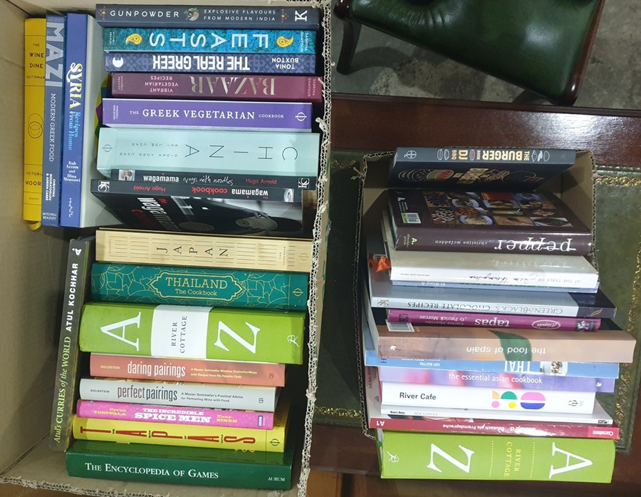 Quantity of cookery books including "Green & Black's Chocolate Recipes", "The Wagamama Cookbook", "