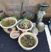 Six various Chinese-style planters of varying sizes and a composite pillared sundial and bird bath