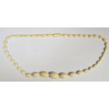 Ivory bead necklace, graduated, oval beads with spacers, 54cm long