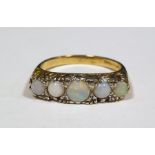 Five stone opal 9 ct gold dress ring