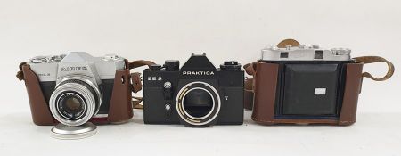Praktica EE2 camera body, Aires Penta 35 camera, another camera, Telegraph Works Silvertown of