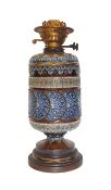 19th century Doulton Lambeth patent stoneware oil lamp decorated with stylised relief decoration