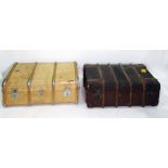 Two steamer trunks, one in a cream leather and wood-bound, the other brown leather and wood-bound (