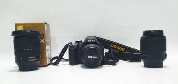 Nikon D3200 camera and two lenses Condition ReportThe camera powers up and has no obvious damage