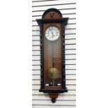 Tall Vienna regulator wall clock in polished mahogany case, the movement is single weight with large
