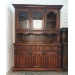 20th century pine dresser with two doors above open recess and base of three drawers, three cupboard