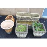 Two rectangular moulded concrete planters in the form of drystone walls, two tapered square