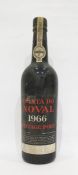 Bottle of Quinta Da Novale 1966 vintage port, label is present but damaged, wax capsule top is