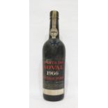 Bottle of Quinta Da Novale 1966 vintage port, label is present but damaged, wax capsule top is