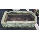 Stone trough Condition ReportThe trough is d-ended natural stone measuring 90L x 40W x 26H (cm). Two