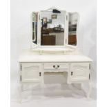 White painted dressing table with three-section mirror above drawer and two cupboard doors, raised
