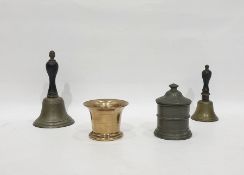 Bronze mortar, lead tobacco jar of turned cylindrical form, and two brass bells (4)