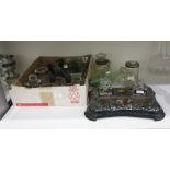 Collection of glass and metal-mounted inkwells, various medical bottles, an eye bath, a measuring