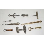 Collection of various novelty and other corkscrews and implements to include one in the form of