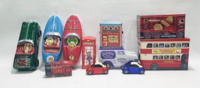 Large quantity of tin boxes in the shape of lorries, cars and other items