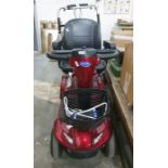 Invacare Leo Mobility scooter in claret livery with battery charger plus a walking frame with