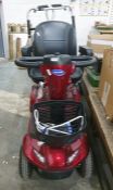 Invacare Leo Mobility scooter in claret livery with battery charger plus a walking frame with