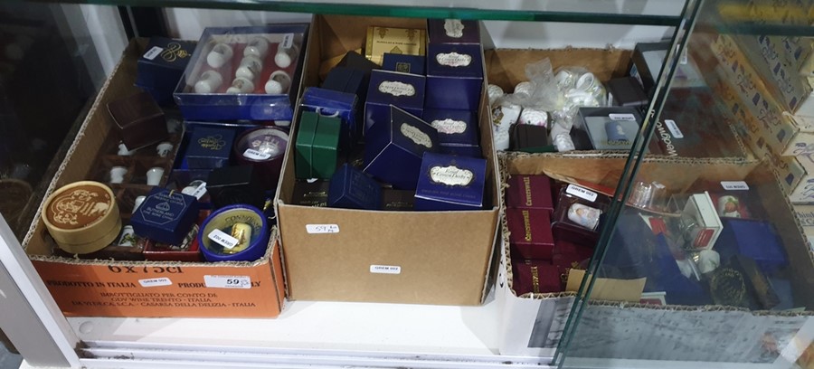 Interesting collection of porcelain thimbles to include Royal Crown Derby, Wedgwood, etc (4 boxes