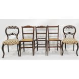 Pair of Victorian mahogany salon chairs with serpentine fronts, cabriole supports and three