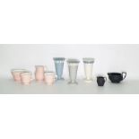 Three various Wedgwood porcelain Queensware vases, a Wedgwood bone china white and pink milk jug,