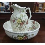 Victorian pottery toilet ewer and basin, spirally ribbed and flowering dog-rose spray decorated