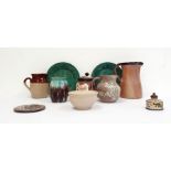 Collection of 20th century studio pottery to include a brown half glazed jug, another jug