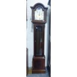 Modern three-train longcase clock featuring brassed and aluminium chapter ring dial with Roman